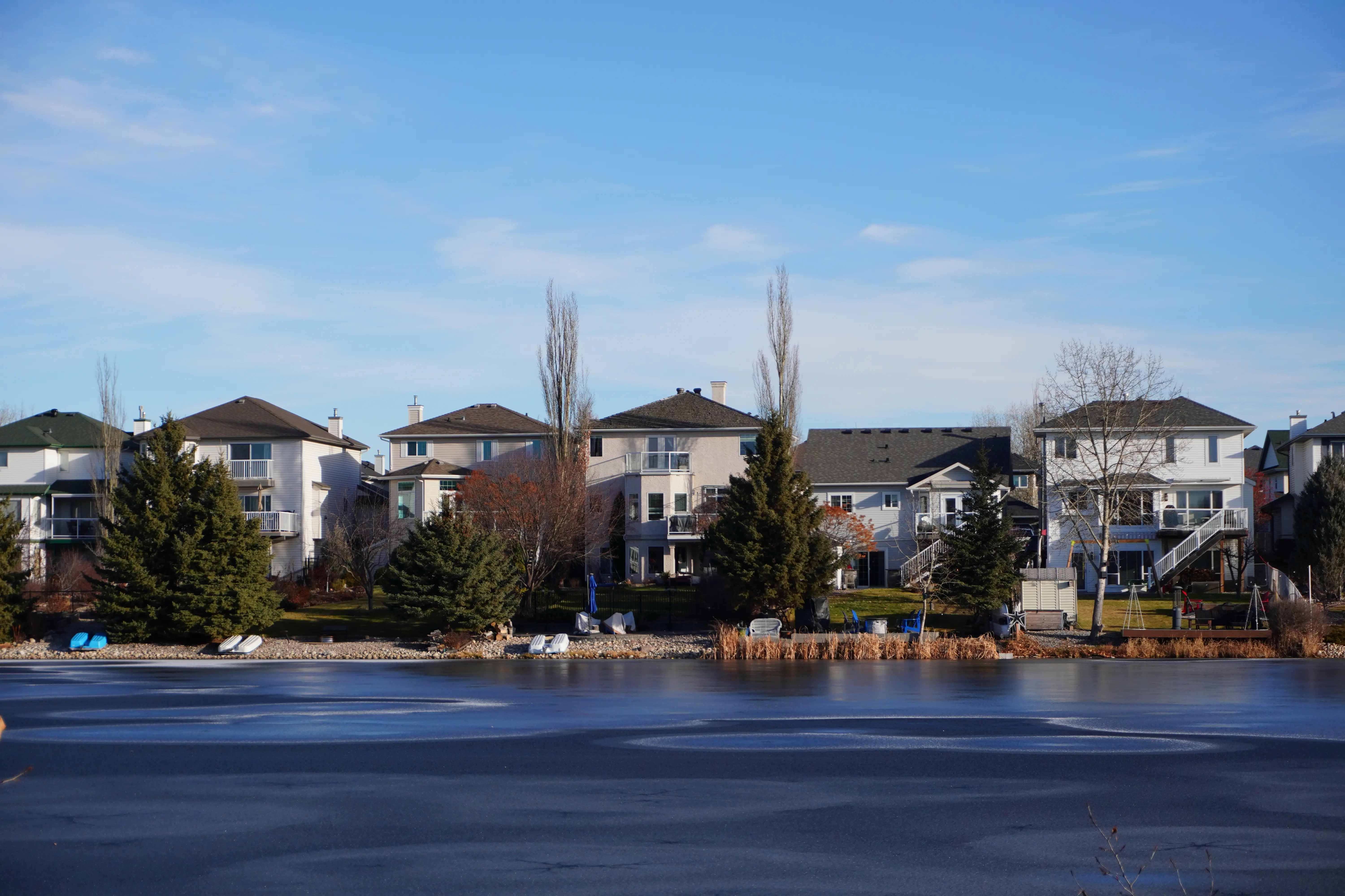 Landscape with houses and lake